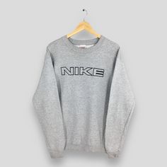 Vintage Nike Block Embroidery Gray Sweatshirt Medium 90s Nike Spell Out Pullover Nike Just Do It Sportswear Jumper Nike Baggy Sweater Size M Size On Tag :- Size M Manual Measurement :- WIDTH (armpit to armpit) :- 20" inches LENGTH (shoulder to end of garment) :- 28" inches WEIGH :- 0.42 kg Condition :- Good Condition. No holes and no stains. - Colors Might Be Different Due To Lighting. - All items are VINTAGE which show some signs of wear and tear. FEDEX EXPRESS = 3-6 business day arrived Please Pull Nike, Baggy Sweater, Baggy Sweaters, 90s Nike, Gray Sweatshirt, Nike Vintage, Fedex Express, Nike Just Do It, Grey Sweatshirt