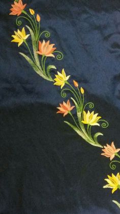 a black background with yellow and orange flowers on the left side of the image, along with swirls in the middle