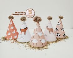 five paper party hats with farm animals on them and the number 5 in the middle