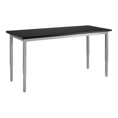 a black table sitting on top of a white floor