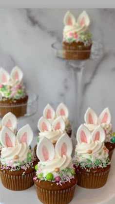 cupcakes decorated with bunny ears and sprinkles