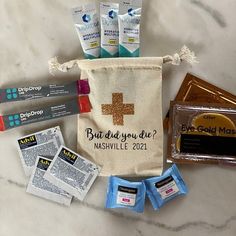 the contents of a personal care kit laid out on a marble surface