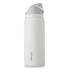 thermos bottle is white and has a plastic cap on it's side