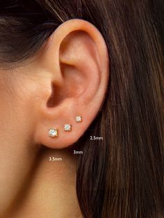 "A must-have in any jewelry collection, these dainty studs look beautiful with everything. Faceted round brilliant cubic zirconia hand-set in a high quality 4-prong setting. Discreet and undeniably classic, these are the perfect everyday stud earrings. ♦ SOLD AS A PAIR ♦ Size: Choose between 2.5mm, 3mm and 3.5mm at checkout. * D E T A I L S * ∙ Material: .925 Sterling Silver or 18K Gold Plated over .925 Sterling Silver ∙ Stone: White Zirconia ∙ Dimensions: 2.5mm or 3mm or 3.5mm ∙ Hypoallergenic First Earrings Studs, Seconds Ear Piercing Gold, Diamond Earrings Minimal, Tiny Diamond Stud Earrings, 2 Holes Ear Piercing, Double Ear Piercings Studs, Diamond Second Stud Earrings, Double Ear Piercing Earrings, Second Earlobe Piercing