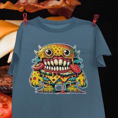 Conjure the Cheeseburger Monster. It sizzles with greasy temptation, and one bite drags you into its endless hunger. Because every little freak deserves a shirt that shows their true form.  Printed on a Gildan 5000 heavy cotton tee, the basic staple of any human wardrobe.  The Gildan 5000 tee is a classic, heavy cotton tee that's built to last. Made from 100% preshrunk cotton, this shirt offers a soft feel with the durability you need. Each design is printed and centered on the chest for a bold Monster Energy T-shirt, Monster Logo Shirt, Graphic Tee T-shirt With Mushroom Design, Horror Themed Cotton T-shirt With Character Print, Monster Tshirt, Kids Holiday, Hobbies And Interests, Holidays With Kids, The Conjuring