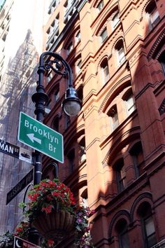 the street signs are clearly visible for all of us to see on this day in new york city