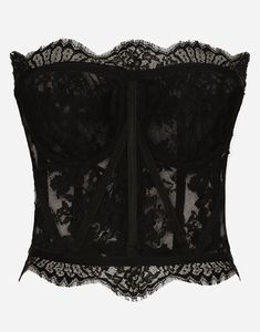 Workmanship, elegance and excellence are the essence of the Dolce & Gabbana collections. Chantilly lace bustier: Sweetheart neckline Sleeveless Structured with underwiring and reinforcement Layered with stretch tulle Back closure with zipper and small hook The garment measures 42 cm – 16.5 inches from the collar topstitching in size 40 IT Model is 175 cm – 68.9 inches tall and wears a size 40 IT Made in Italy Lace Bustier Top, Top Bustier, Lace Corset Top, Fantasy Closet, Lace Bustier, Lace Corset, Dolce E Gabbana, Mode Inspo, Bustier Top