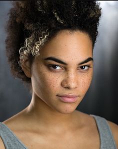 an image of a woman with freckles on her face