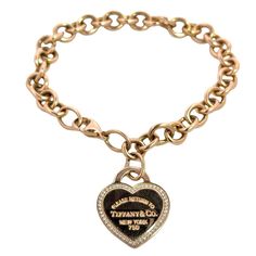 A1 HAWK GLADSTONE 18K Rose Gold Return To Tiffany & Co. Heart Tag Bracelet with Diamonds 31g 8" Description: TIFFANY & CO. 8" GOLD CHARM BRACELET: 31G 18K-Y/G, RETURN TO TIFFANY & CO. 18K DIAMOND HEART BRACELET. AUTHENTIC! RARE, BEAUTIFUL. WITH THE POUCH. Item Material Details: Metal Gold 18K - .750 Length: 8.0" Weight: 31.0 grams Color: Yellow Notes: RARE Return To Tiffany & Co. 18k Diamond Heart Bracelet Tiffany & Co. Heart Tag Bracelet Does have the Pouch but no Box. Shipping Your item will be shipped within 1 business day(s). After shipping your items will be delivered within 1-10 business days. About Us A1 Hawk has proudly served customers since 1987! As a family-owned business, we're dedicated to meeting your unique needs and helping you find exactly what you're looking for. Our exte Yellow Notes, Bracelet With Diamonds, Return To Tiffany, Heart Tag, Gold Charm Bracelet, Bracelets And Charms, Heart Bracelet, The Pouch, Gold Charm