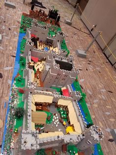 a lego model of a large building on the ground