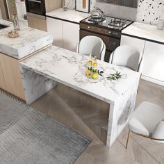 a white marble dining table in a kitchen with two chairs and an oven behind it