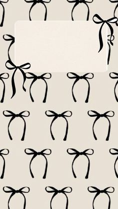 an image of black bows on a white background with a blank paper in the middle