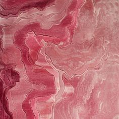 an abstract painting with red and pink colors on the surface, as well as lines