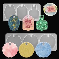 several tags with thank you written on them in different colors and shapes, including pink, blue, green, yellow