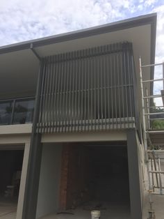 a large building with an open garage door