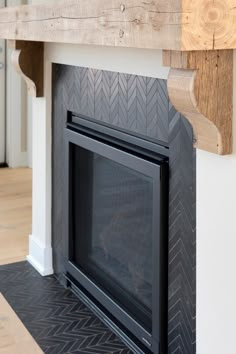 the fireplace mantel is made out of wood