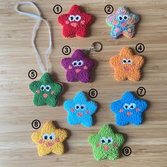 an assortment of felt star ornaments on a wooden table with instructions to sew them