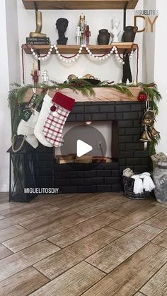 a fireplace decorated for christmas with stockings and stocking