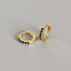 14k Yellow Gold & Black Cz Paved Huggie Hoop Earrings Price Is For 1 Pair (2 Pieces) Stone(S) Details: Stones: 11 Cz Gemstones Each (22 In Total) Stone Type: Cubic Zirconium Stone Color: Black Stone Shape: Round Stone Size: 1.5mm (Each) Stone Setting: Hand-Set Metal Details: Metal Type: Sterling Silver Metal Color: Yellow Gold Metal Finish: Beautifully Polished Karat: 14k Earring Design Details: Earring Style: Huggie Hoop Earring Back: Hinged Inner Diameter: 7mm Outer Diameter: 10mm Dainty Hoop Earrings, Ear Earrings, Small Hoop Earrings, Sterling Silver Hoop Earrings, Delicate Earrings, Huggie Hoop Earrings, Sterling Silver Hoops, 925 Sterling Silver Earrings, Silver Hoops