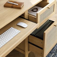 a computer desk with a keyboard and mouse