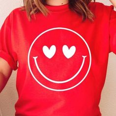 Red Heart Eyes Smiley Face Valentine Graphic Tee 100% Airlume Cotton Valentines Valentine Graphic, Valentines Graphic Tee, Buff Bunny, Pink Choker, Metallic Shorts, Green Polo Shirts, Black Short Sleeve Shirt, Drop Shoulder Tee, Embroidered Tee