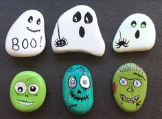 five painted rocks with faces and eyes on them