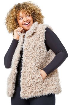 Curve Textured Faux Fur Gilet from Roman. Beat the chill with this cosy curve gilet. Designed in a fluffy, knitted fabric and completely fully lined this is sure to keep you warm. With a collar detail and edge to edge opening this oozes quality. Pair with your favourite knitwear and denim with chunky boots for a perfect Autumn outfit! Faux Fur Gilet, Fur Gilet, Petite Jumpsuit, Petite Coat, Plus Size Coats, Tall Clothing, Cold Weather Outfits, Petite Tops, Chunky Boots