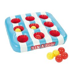 an inflatable game set with balls on the ground and two pieces of gummy