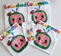 four children's t - shirts with cartoon characters on them