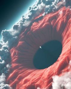 an eyeball in the sky surrounded by clouds