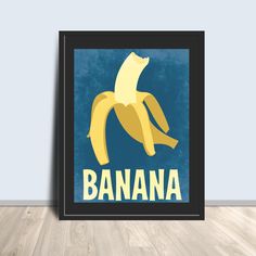 a framed poster with the words banana on it