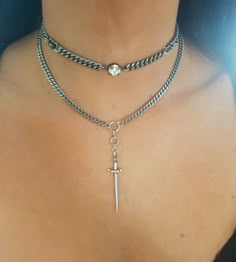 ♦ A silver chain choker made of silver-plated brass in very high quality with a sword.  SIZE  Length: 15.8" (40cm) up to 19.8"(50cm) The size refers to the bottom chain  width pendant:0.38" (1 cm)  high pendant: 2.16(5.5cm)  ♦ This piece of jewelry is perfect as a gift for yourself, for the wedding day, Valentine's day or a birthday. If      you're interested in sending a gift to a third party, just write your message to the recipient and I will do so      with joy. ♦ The jewel will be sent by r Jewelry Grunge, Choker Necklace Silver, Gothic Choker, Silver Link Necklace, Grunge Jewelry, Gothic Chokers, Jewelry Gothic, Goth Style, Witch Jewelry