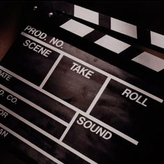 a movie clapper sitting on top of a table