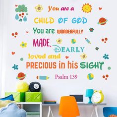 a child's room with colorful wall decals