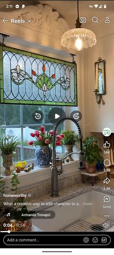 an image of a kitchen window with flowers in it