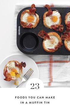 an egg and bacon muffins in a muffin tin with a fork on the side