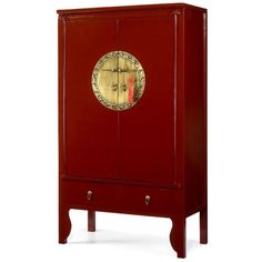 a red cabinet with gold decorations on the front and bottom doors, sitting against a white background