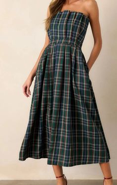 Plaid strapless midi dress featuring pleat detail at bust. Smocking and zipper closure at back. Pocket at sides. - Lined, non-sheer, lightweight.Fabric Contents - 100% Polyester Plaid Smock Dress, Strapless Ruched Midi Dress For Casual Wear, Strapless Pleated Skirt Dress, Fitted Midi Dress For Holiday, Casual Midi Dress For Holiday, Casual Knee-length Strapless Dress For Date Night, Spring Strapless Dress With Pleated Skirt, Fitted Midi Length Strapless Dress With Smocked Back, Fitted Midi Strapless Dress With Smocked Back