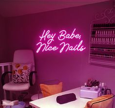 a pink neon sign that says hey bake, nice nails