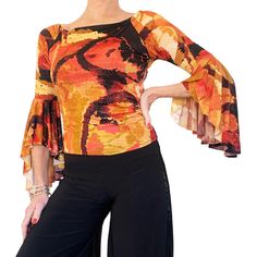 Shown here in our Autumn Abstract Jacquard stretch jersey . Versatile boatneck top can be worn on or off the shoulder. Raglan sleeve with  3/4 sleeve ending in a fabulous bell cuff. Sleeves drape and flutter beautifully when you dance! Call for print options. Stretch poly/spandex jersey. Hand or machine wash cold. Item #TL219. Fabric & Care: -Easy care, no-wrinkle poly/spandex -Hand wash cold. Hang dry. Overview: -Longer lengths available on request, no additional charge. -Great for travel - rolls up small. -Handmade in our studio in Santa Fe, New Mexico USA. Questions about fabric, fit or size? Email me. I am delighted to help. Size        Bust          Waist           Hip 4          32" - 34"    24" - 26"     34" - 36"                          81-86cm       60-66cm    86-91cm 6 Fitted Boat Neck Summer Tops, Elegant Stretch Top With 3/4 Sleeves, Fitted Boat Neck Top, Fitted Boat Neck Top For Fall, Elegant Boat Neck Tops For Fall, Chic Stretch Boat Neck Top, Chic Stretch Tops With Boat Neck, Fitted Blouse With 3/4 Sleeves For Fall, Stretch Long Sleeve Top For Fall