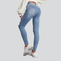 Discover the epitome of alternative-style fashion with our distressed skinny jeans from 2023 Spring-Summer Collection—the perfect combination of vintage allure and vogue-day flair!Why You'll Love These JeansAmp up your wardrobe with a pair that effortlessly blends the best of vintage trendy with contemporary style. This high-waisted piece features a zipper and button closure. ensuring a secure fit and giving you all the confidence to strut your stuff. Stretchy fabric also makes it the ideal comp Trendy Stretch Distressed Cropped Jeans, Trendy Stretch Jeans With Frayed Hem, Trendy Non-stretch Cropped Jeans In Denim Blue, Trendy Mid-rise Jeans With Frayed Hem, Trendy Stretch Mid-rise Cropped Jeans, Trendy Stretch Flare Jeans, Trendy Ripped Stretch Flare Jeans, Trendy Ripped Cropped Jeans, Trendy Non-stretch Denim Blue Cropped Jeans