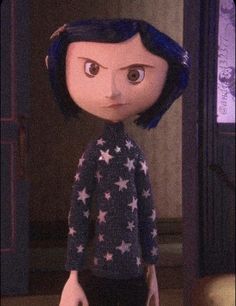 an animated doll with blue hair and stars on it's shirt, standing in front of a door