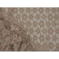 an image of lace fabric with flowers on it