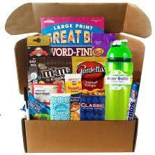 an open cardboard box filled with snacks and drinks