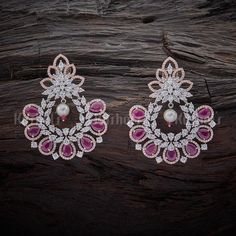 Designer zircon earrings studded ruby and white cz stones and plated with gold polish and made of copper alloy   #zircon #earrings #jewellery #kushalsfashionjewellery #trendy Cz Jewellery, Gold Jewelry Simple Necklace, Zircon Earrings, Diamond Necklace Set, Diamond Jewelry Necklace, Gold Jewelry Simple, Zircon Jewelry, Wedding Accessories Jewelry