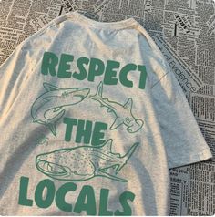 Wearing a "Respect the Locals" shirt isn't just about making a fashion statement--it's a way to honor the natural world and the communities that rely on it. These shirts feature a vibrant designs inspired by marine life, capturing the beauty and diversity of our oceans. But beyond the aesthetics, they carry a deeper message of environmental stewardship and cultural appreciation. By sporting this shirt, you're not only showcasing your love for marine ecosystems but also advocating for their prote Cultural Appreciation, Respect The Locals, Environmental Stewardship, Tread Lightly, Harajuku Outfits, Loose Tees, Sustainable Practices, Marine Animals, Coastal Towns