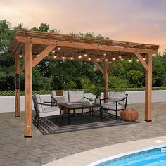 an outdoor patio with seating and lights on the pergolated area next to a swimming pool