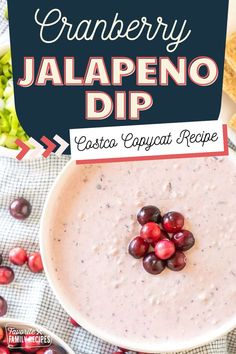 cranberry jalapeno dip in a white bowl surrounded by fresh fruit