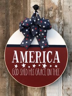 a patriotic sign with the words america god shed his grace on thee