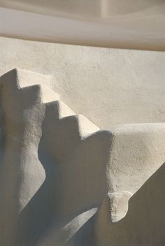 the steps are made out of concrete and have been painted white